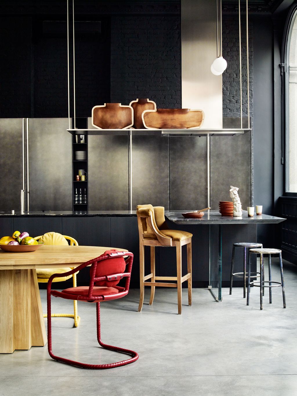 Image may contain Furniture Chair Restaurant Cafe Indoors Room Dining Table Table Cafeteria and Interior Design