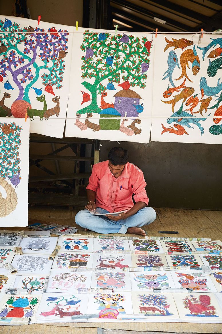 Image may contain: Human, Person, Rug, Text, Clothing, and Apparel