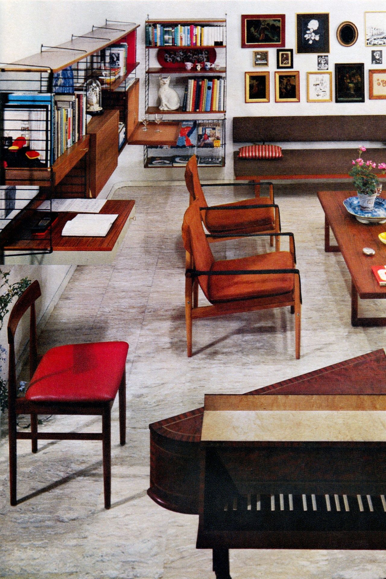 Image may contain Furniture Chair Interior Design Indoors Room Wood Flooring Living Room Hardwood Lobby and Table