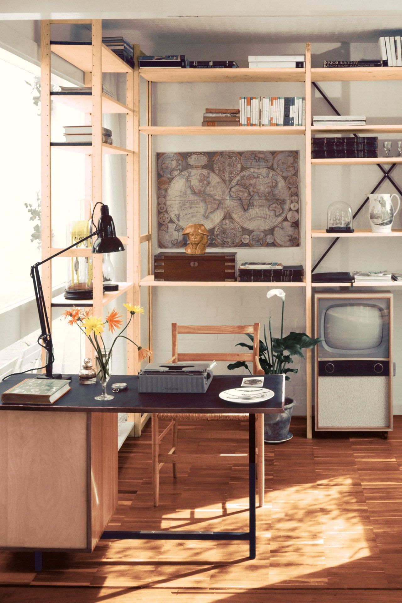 Image may contain Furniture Electronics Monitor Display Screen Table Tabletop Desk Wood TV and Television