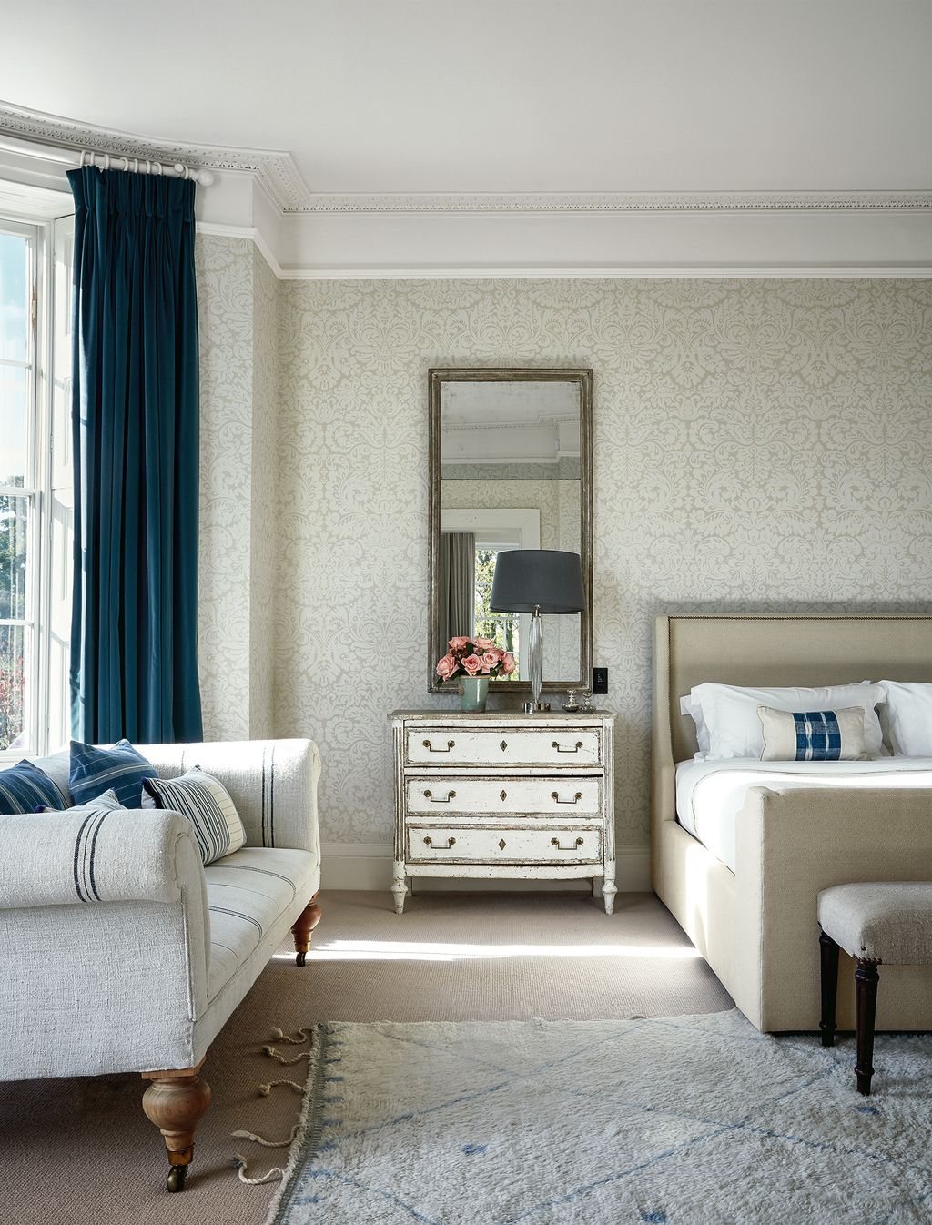 Image may contain Furniture Indoors Room Interior Design Living Room Bedroom and Rug