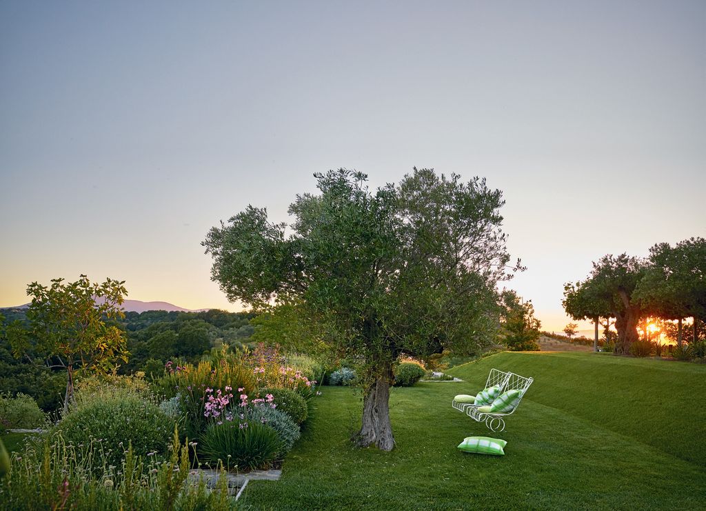 The terraces and banks are dotted with simple seating areas that encourage rest and contemplation. There are carefully...