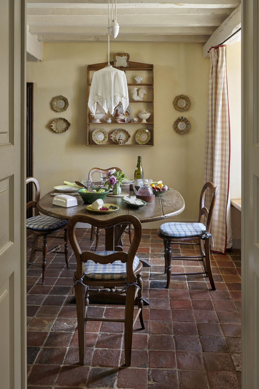 Image may contain Furniture Chair Room Indoors Dining Room Dining Table Table Flooring and Interior Design