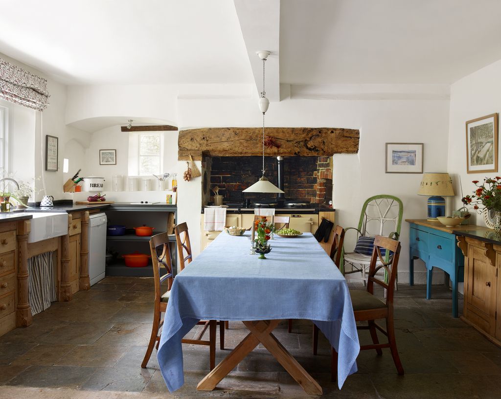 Image may contain Furniture Room Indoors Wood Chair Dining Table Table Plywood Interior Design and Flooring