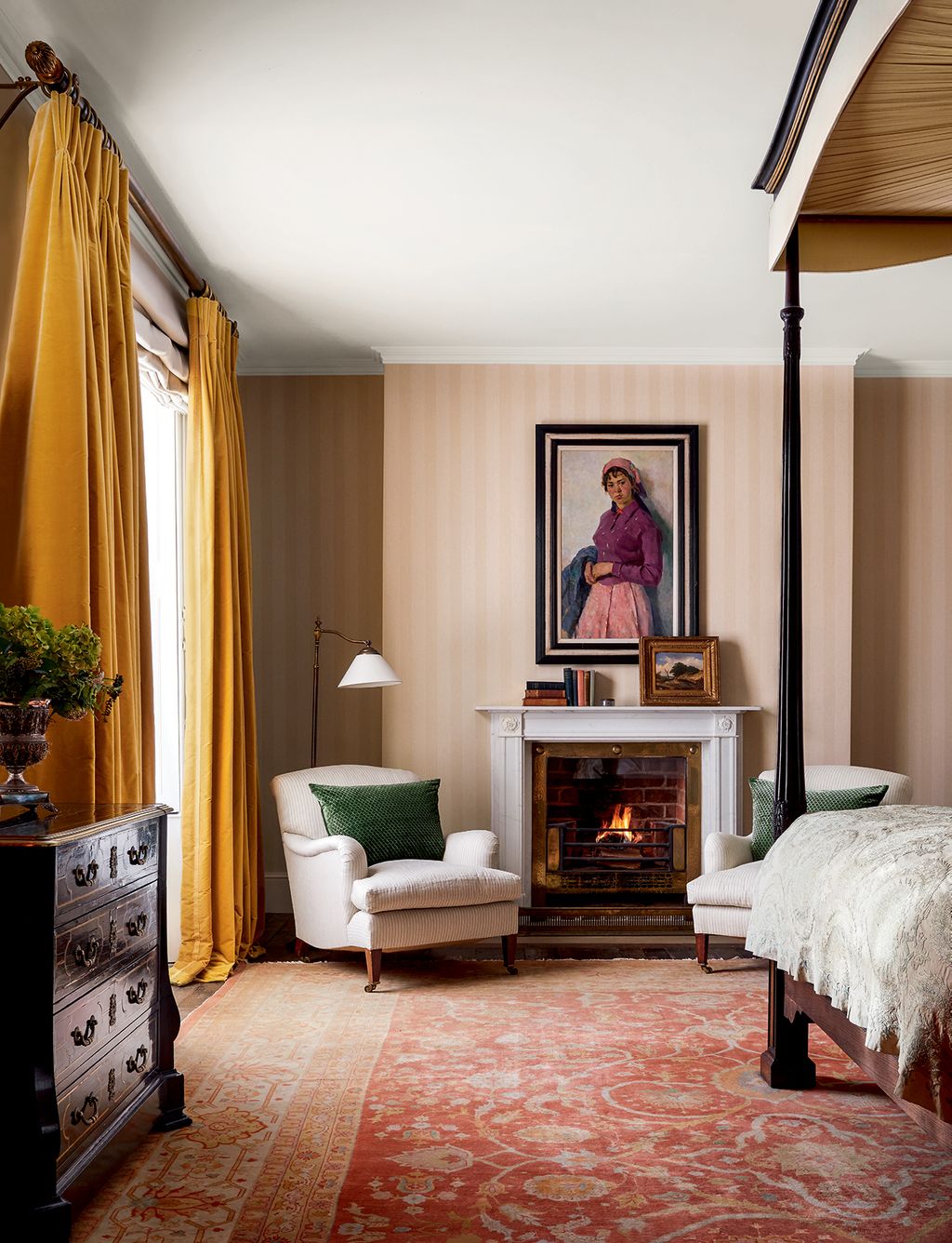 Image may contain Living Room Room Indoors Furniture Fireplace Hearth Interior Design Human Person and Home Decor