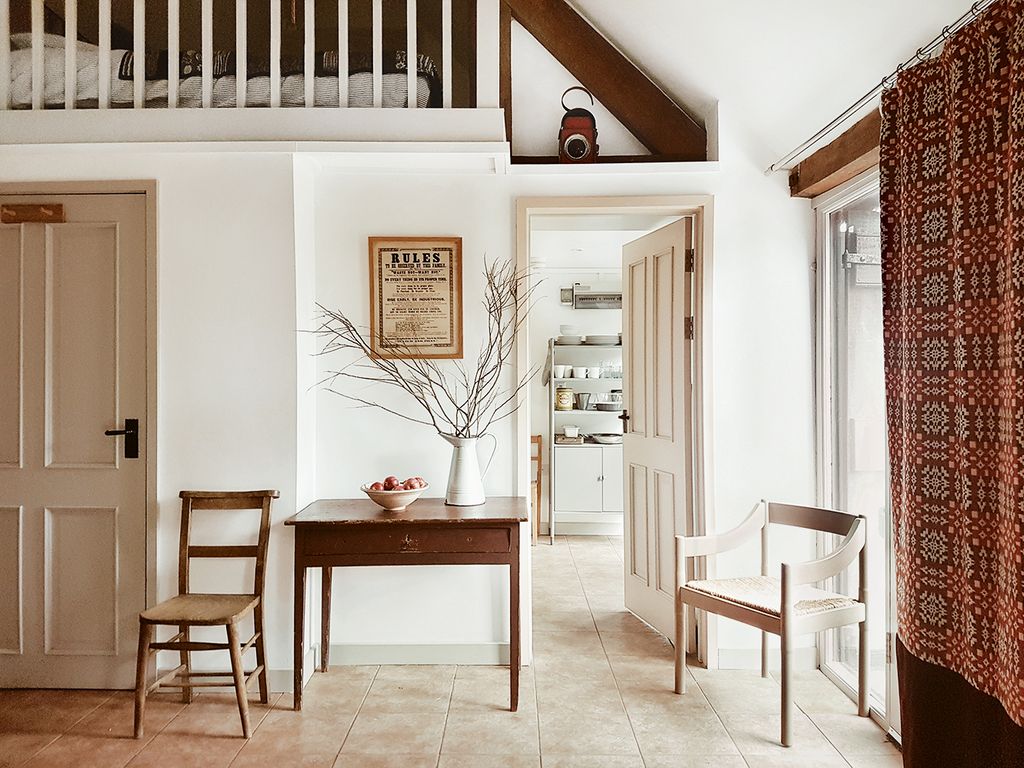 Image may contain Floor Flooring Furniture Interior Design Indoors Chair Table and Room