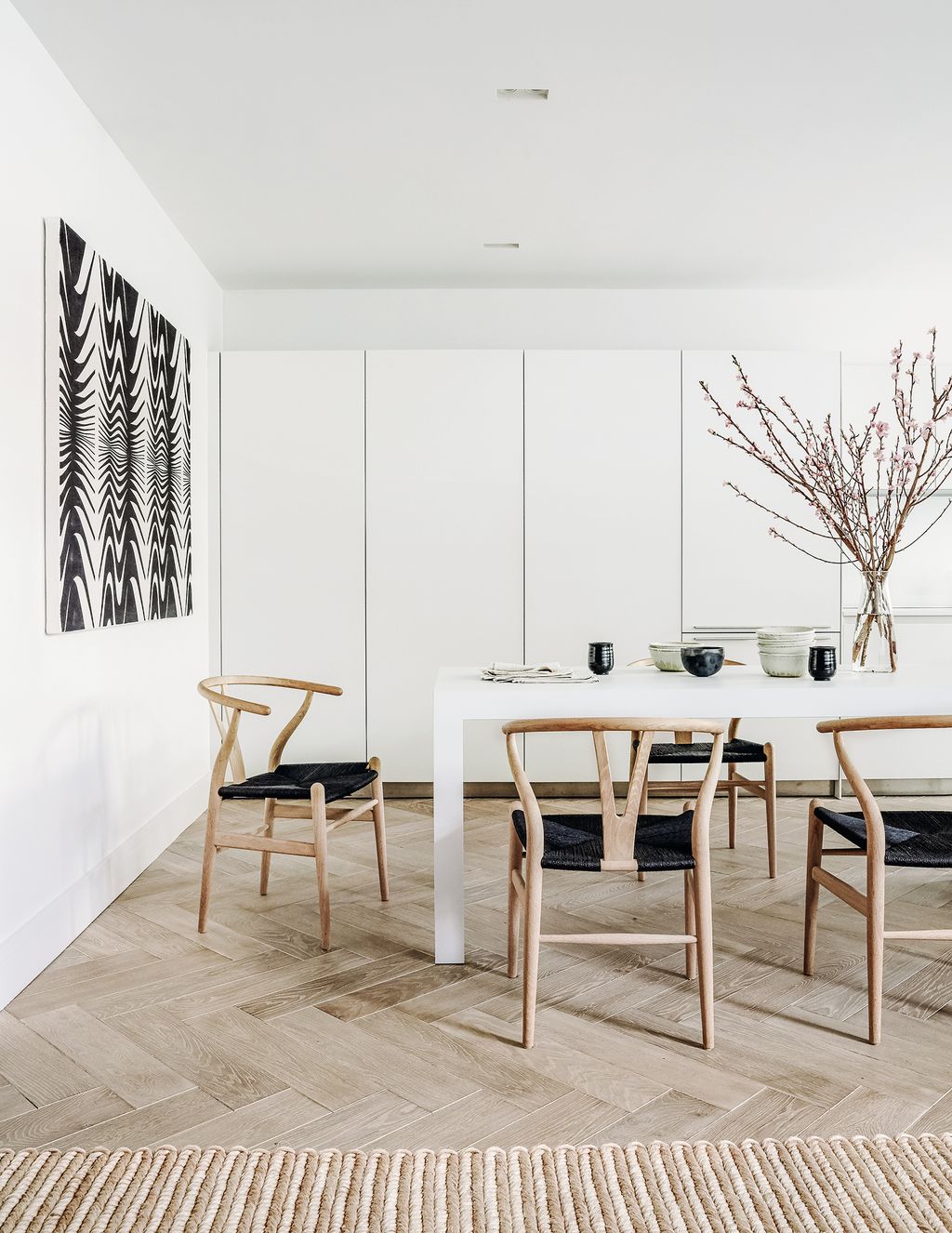 Image may contain Furniture Table Dining Table Rug Indoors Tabletop Room and Chair