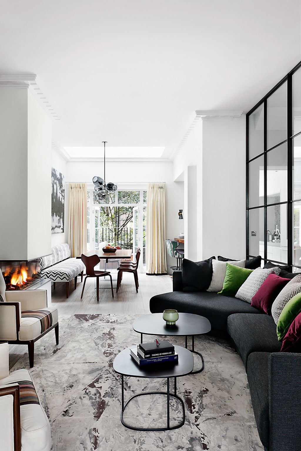 Image may contain Furniture Table Chair Living Room Room Indoors Interior Design Coffee Table Housing and Building