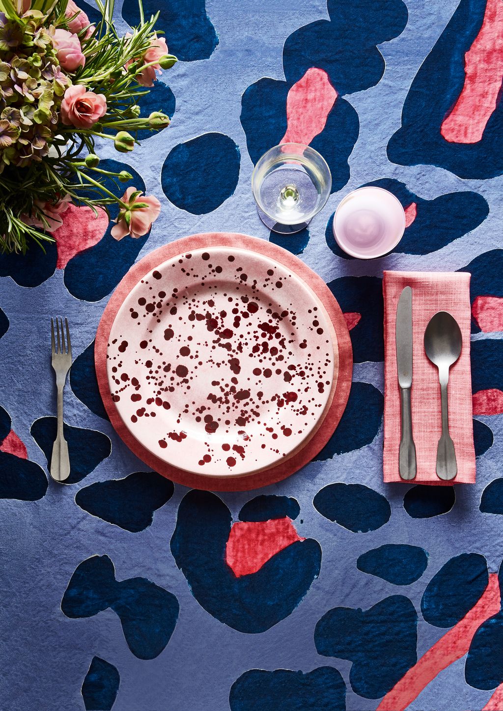 Image may contain Rug Cutlery Spoon and Plant