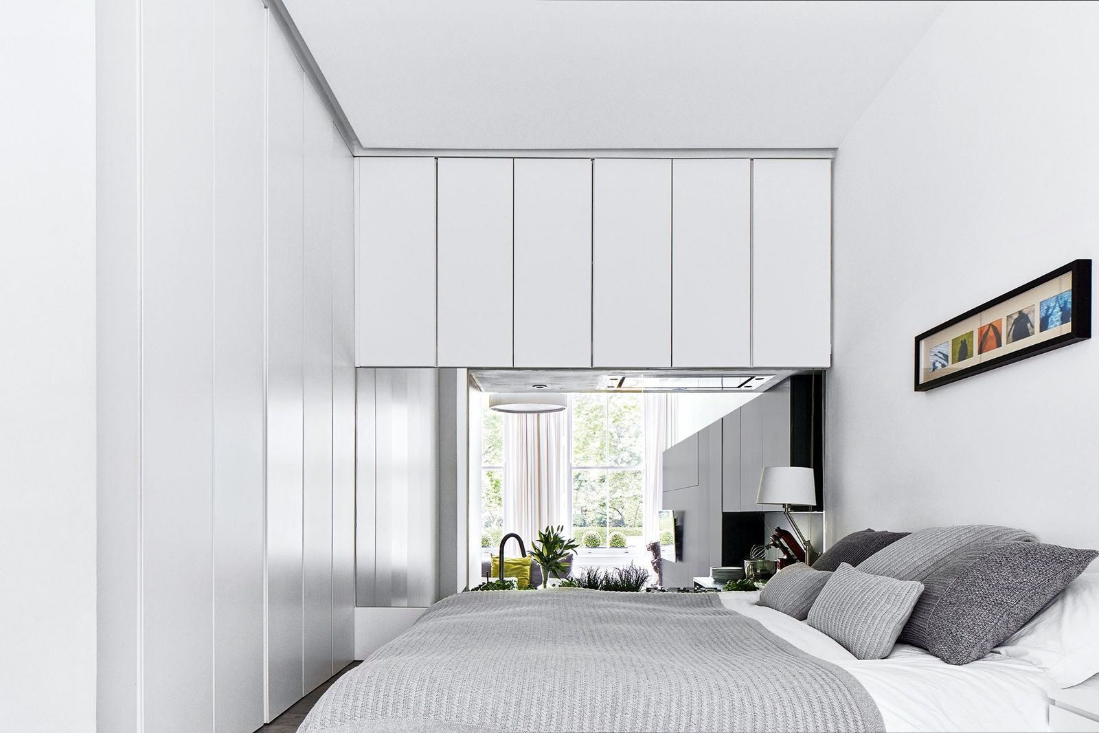 Image may contain Indoors Room Bedroom Furniture Interior Design Bed and Dorm Room