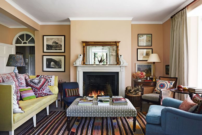 Living room design ideas. Image may contain: Furniture, Living Room, Room, Indoors, Fireplace, Cushion, Hearth, Interior Design, Couch, and Pillow