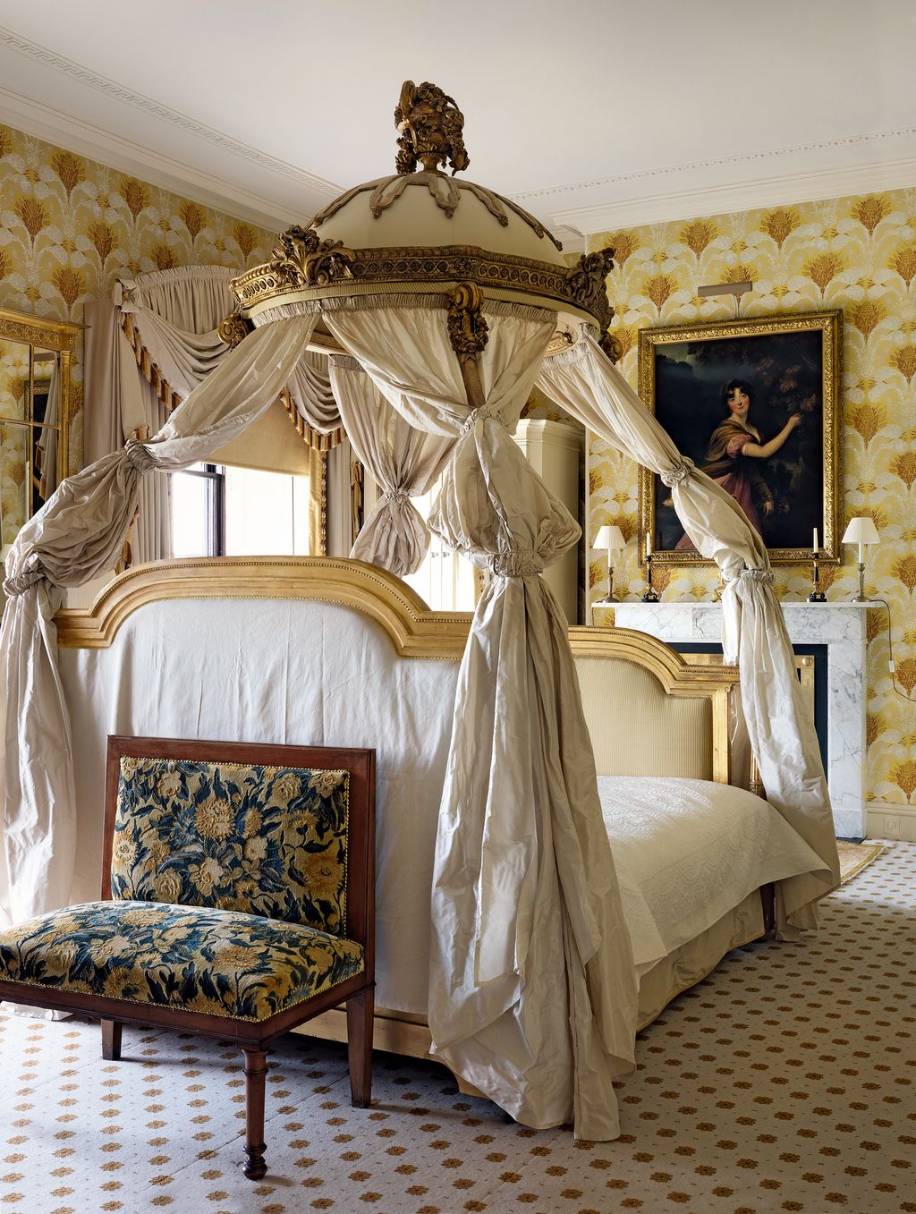 Image may contain Furniture Home Decor Interior Design Indoors Room Bedroom Human Person Bed and Flooring