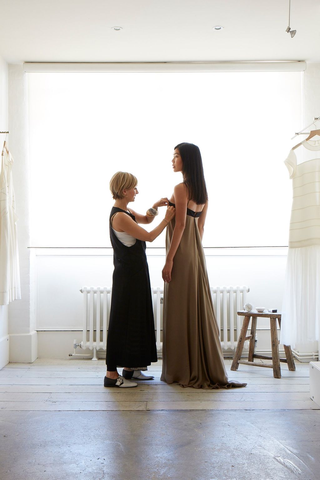 Image may contain Clothing Apparel Evening Dress Fashion Gown Robe Human Person Dress Furniture and Flooring