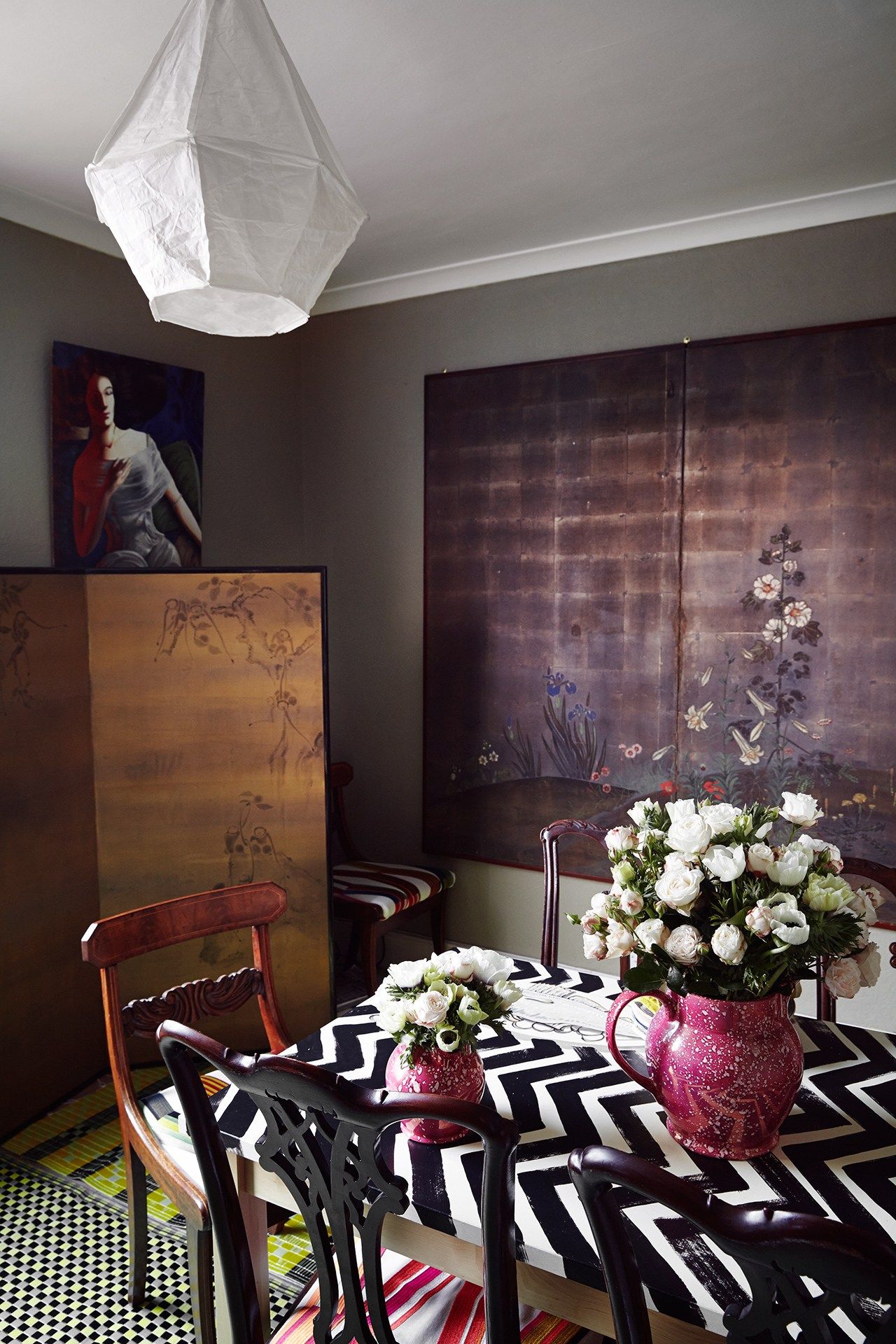 Image may contain Plant Human Person Furniture Chair Flower Blossom Flower Bouquet and Flower Arrangement