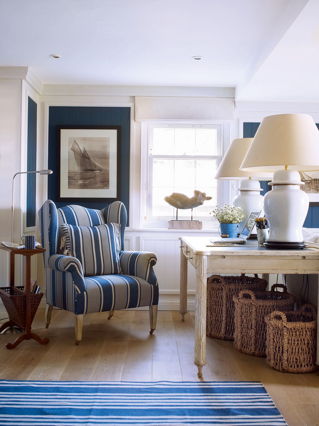 Image may contain Furniture Living Room Room Indoors Lamp Table Lamp Rug Couch Home Decor and Flooring