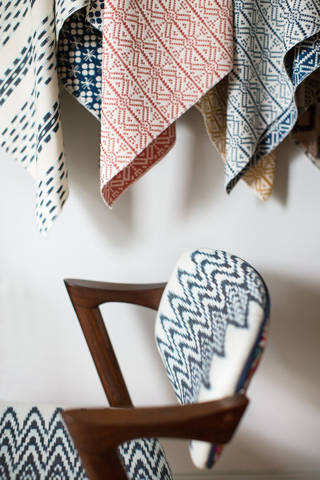 Image may contain Home Decor Accessories Tie Accessory Linen Cushion and Furniture