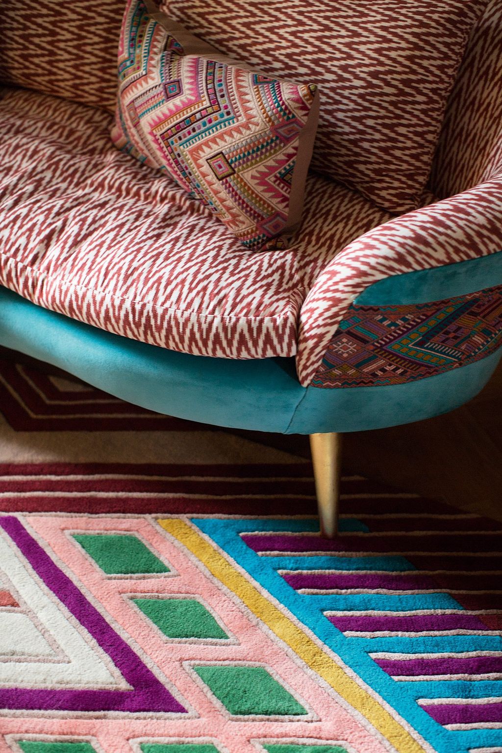 Image may contain Rug Cushion Furniture and Pillow