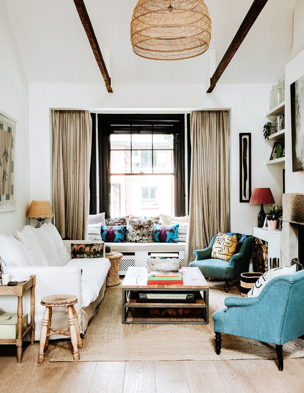 Image may contain Living Room Indoors Room Furniture Couch Table Rug and Flooring