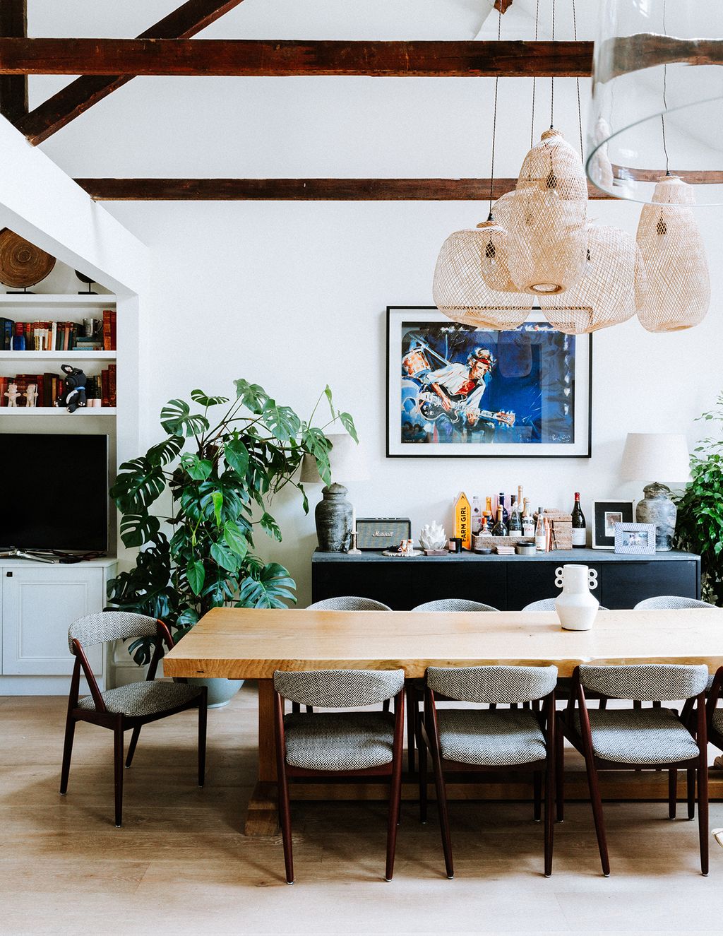 Image may contain Furniture Chair Room Indoors Interior Design Living Room Wood Dining Room Hardwood and Table