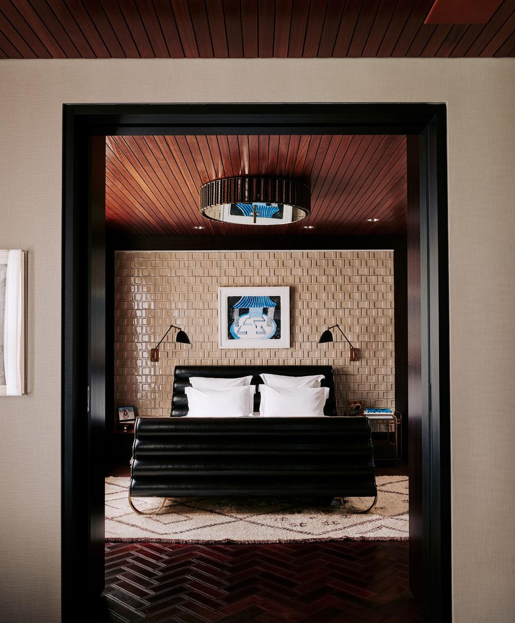 Image may contain Interior Design Indoors Furniture Room Bedroom Bed and Flooring