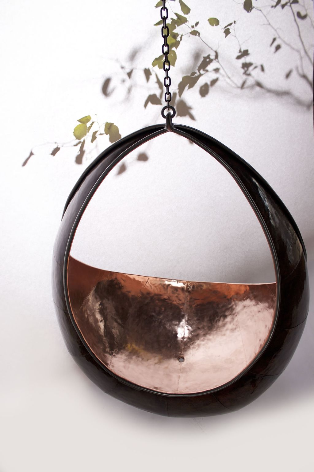 Ostara copper hanging seat by Stephen Myburgh 9000. buttongroup Shop now