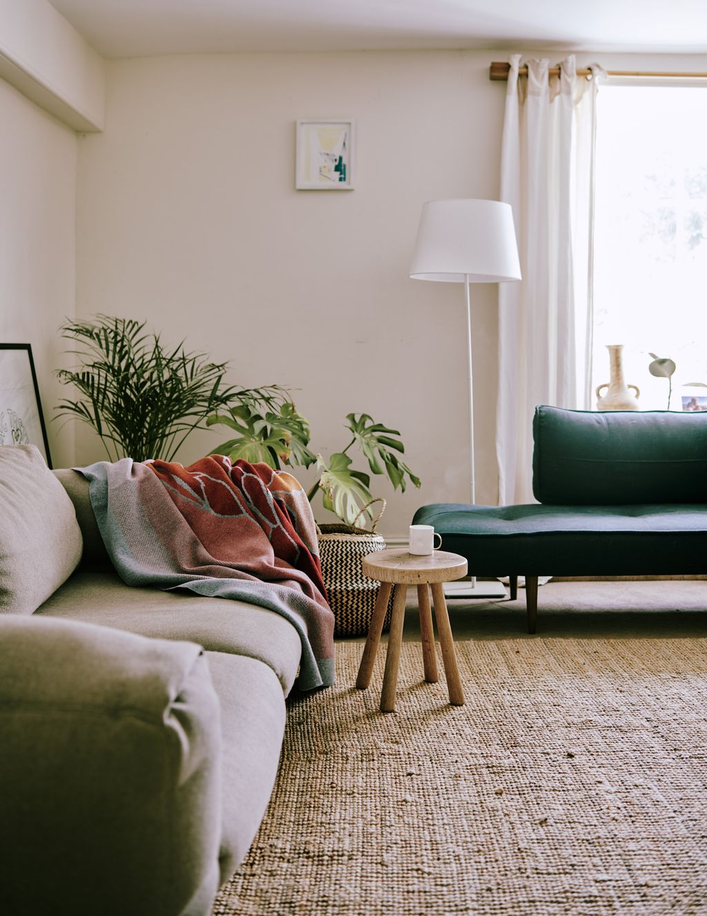 Image may contain Living Room Room Indoors Furniture Couch Home Decor and Interior Design