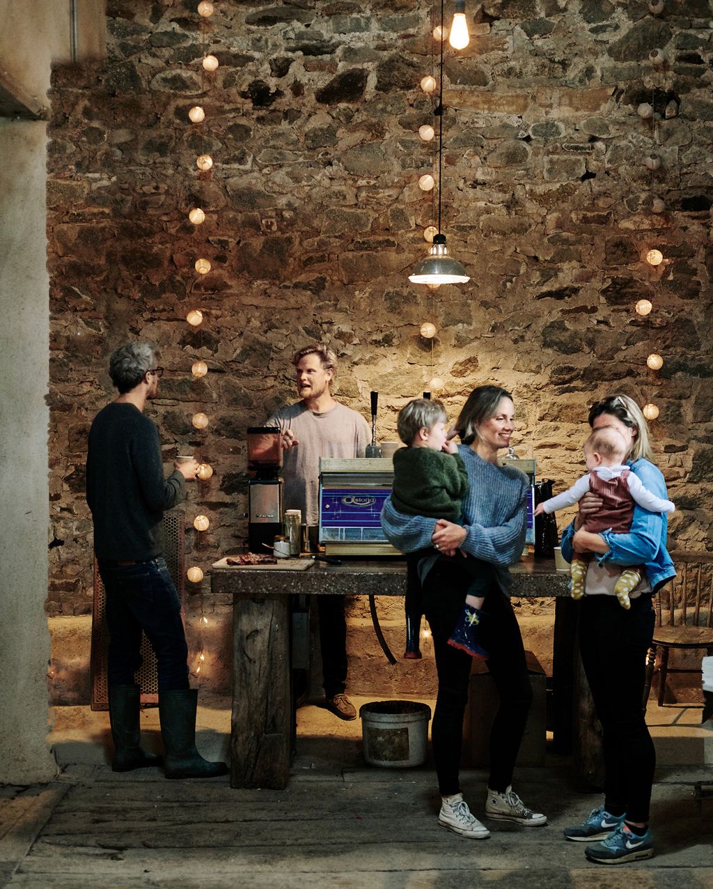 Image may contain Human Person Footwear Clothing Shoe Apparel Wood Restaurant and Plywood