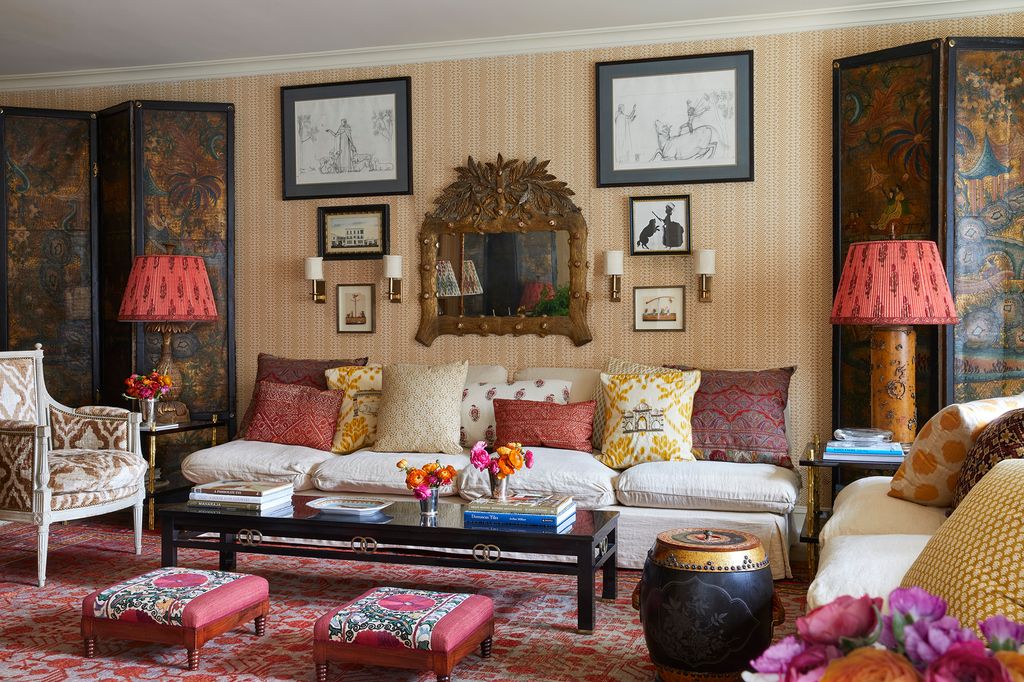 The living room walls are covered in Lisa Fine Textiles Luxor in Sand printed on paperbacked linen. I slipcovered the...