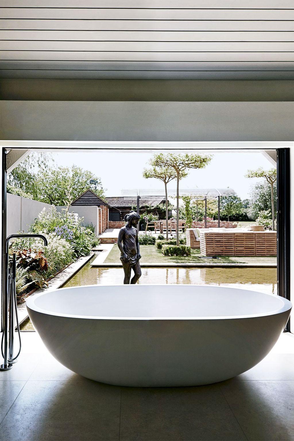 Image may contain Tub Bathtub Human and Person