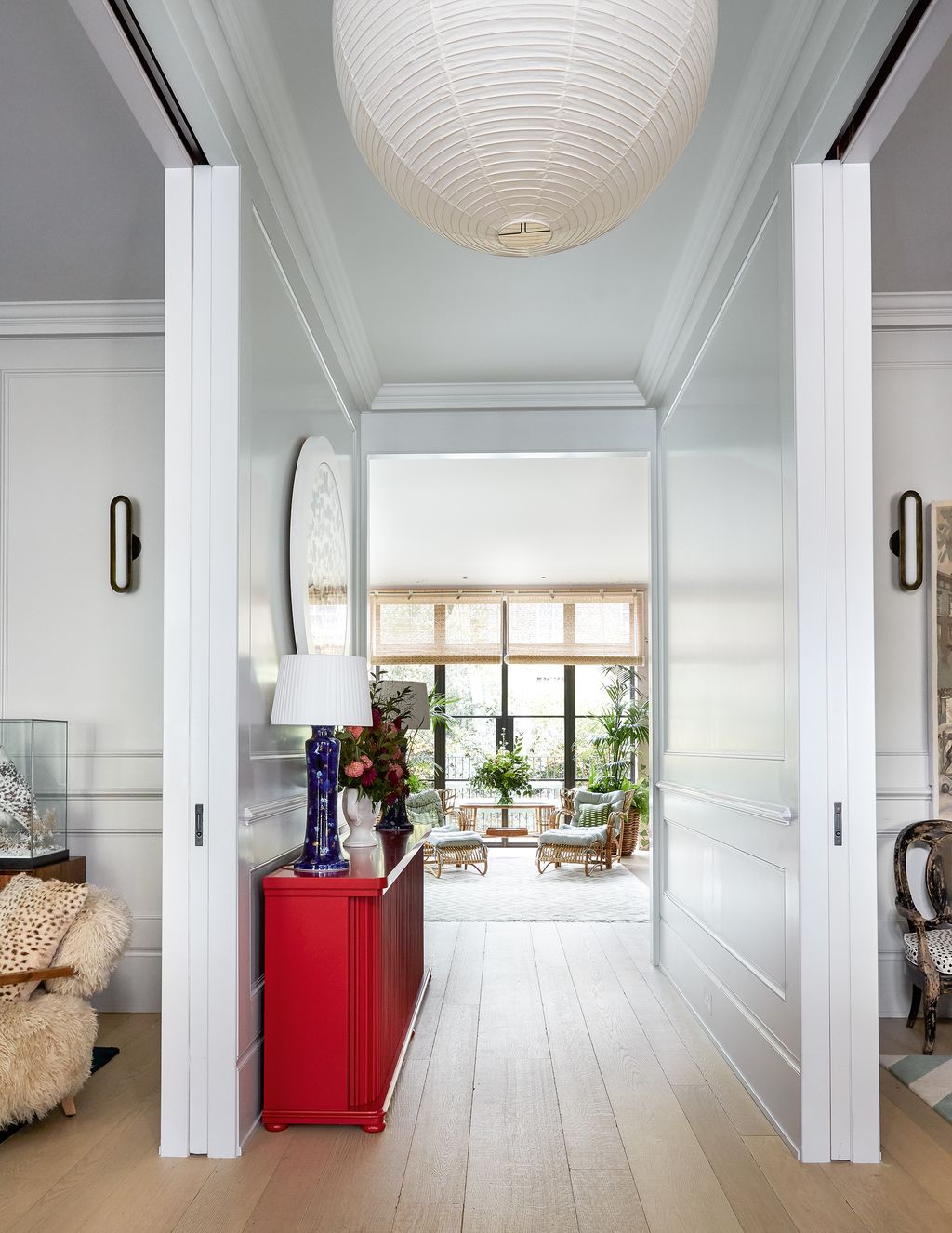 Image may contain Living Room Room Indoors Interior Design Furniture Floor Flooring Cushion Pillow and Lobby