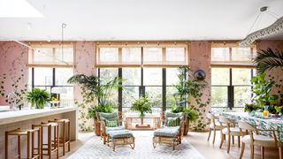 Image may contain Furniture Lobby Room Indoors Interior Design Flooring Table Rug Floor and Chair