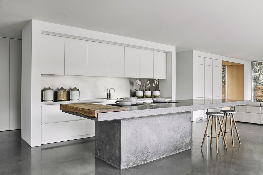 The versatile indoor space is tailored to Sam and Garys needs serving as both a semiprofessional kitchen and an informal...