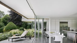 Image may contain Furniture Chair Interior Design Indoors Door Bench and Room