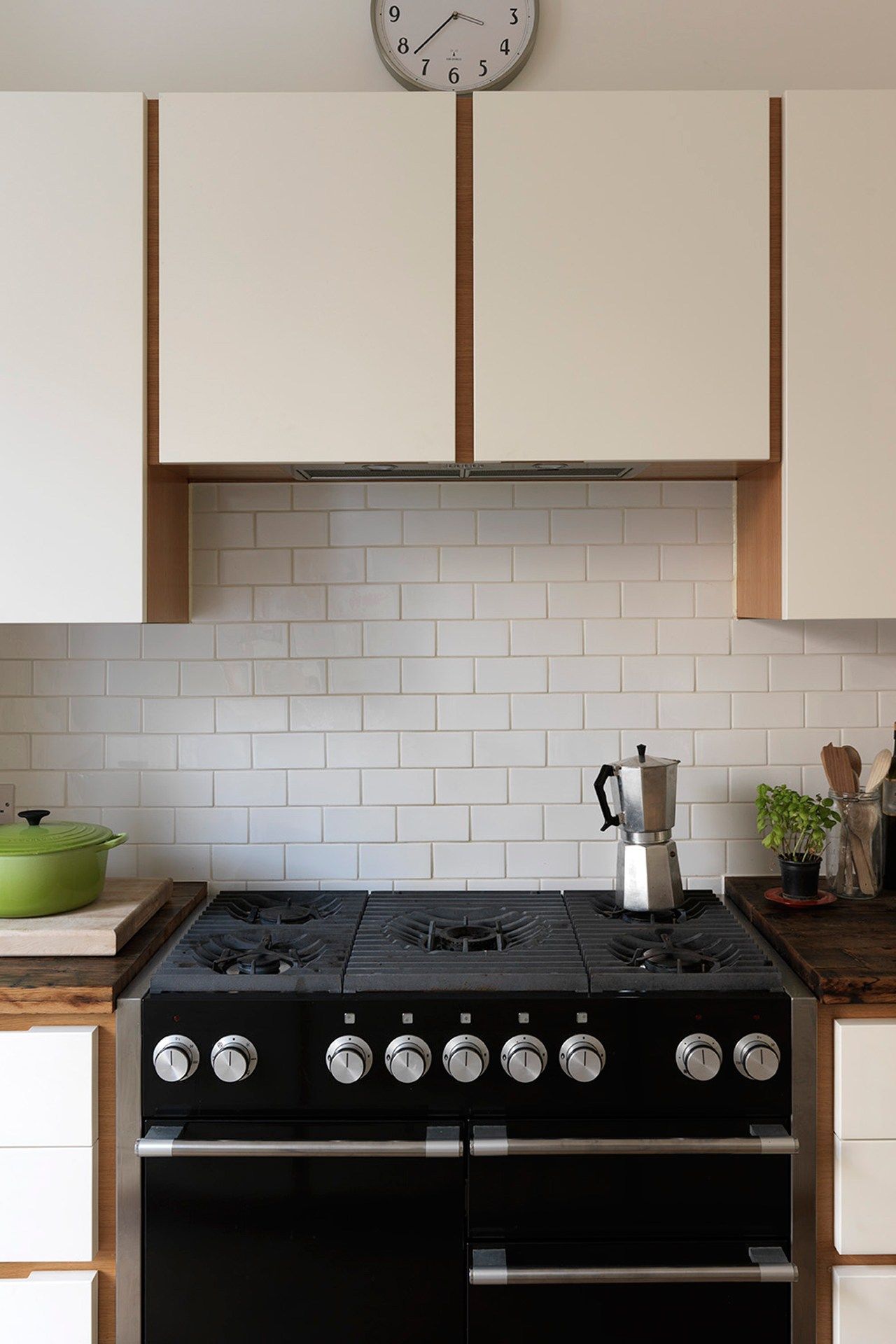 Image may contain Indoors Room Oven Appliance Building Clock Tower Architecture Tower and Kitchen