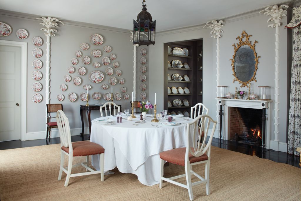 Image may contain Furniture Chair Room Indoors Dining Room Interior Design Home Decor Flooring and Tablecloth