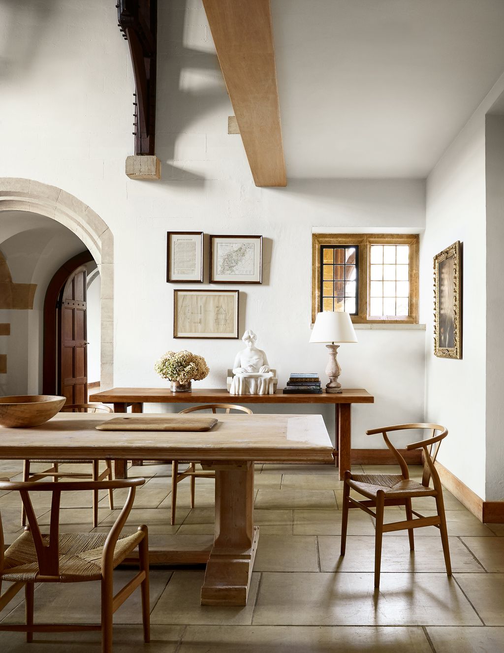 Image may contain Furniture Dining Table Table Room Indoors Dining Room Chair Wood and Flooring