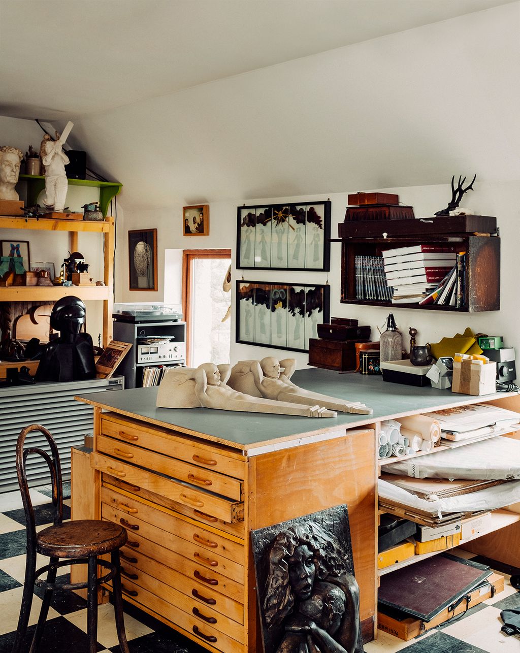 Image may contain Shelf Furniture Wood Chair Interior Design Indoors Living Room Room and Plywood