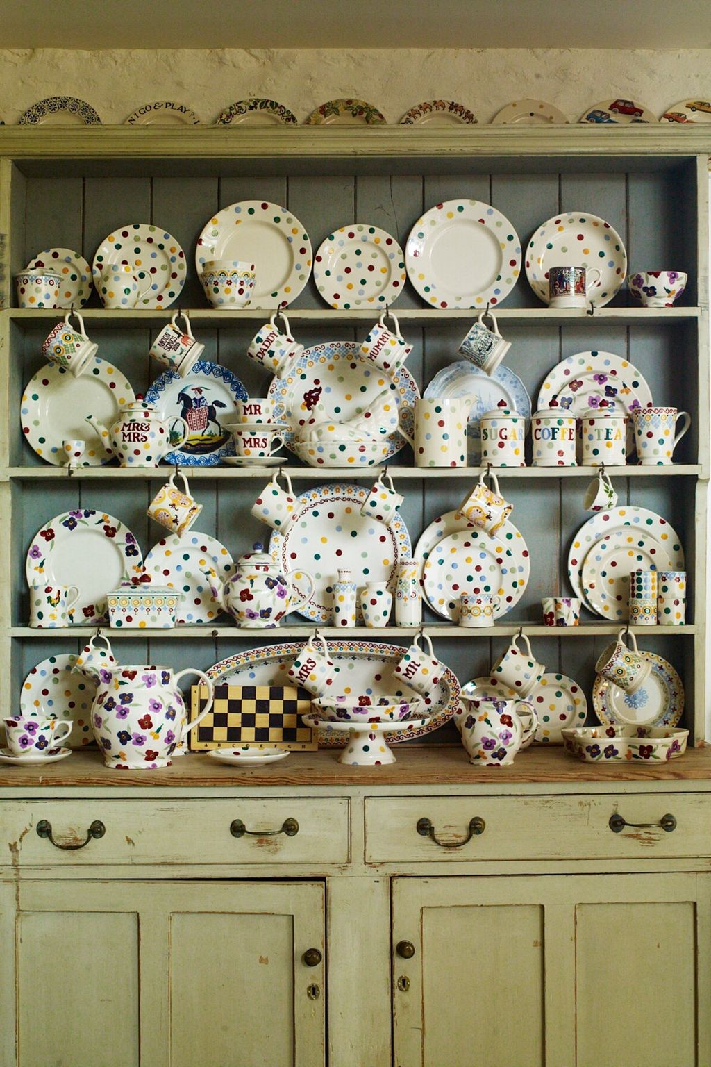 Image may contain Porcelain Art Pottery Clock Tower Architecture Tower Building Furniture Food Dish and Meal