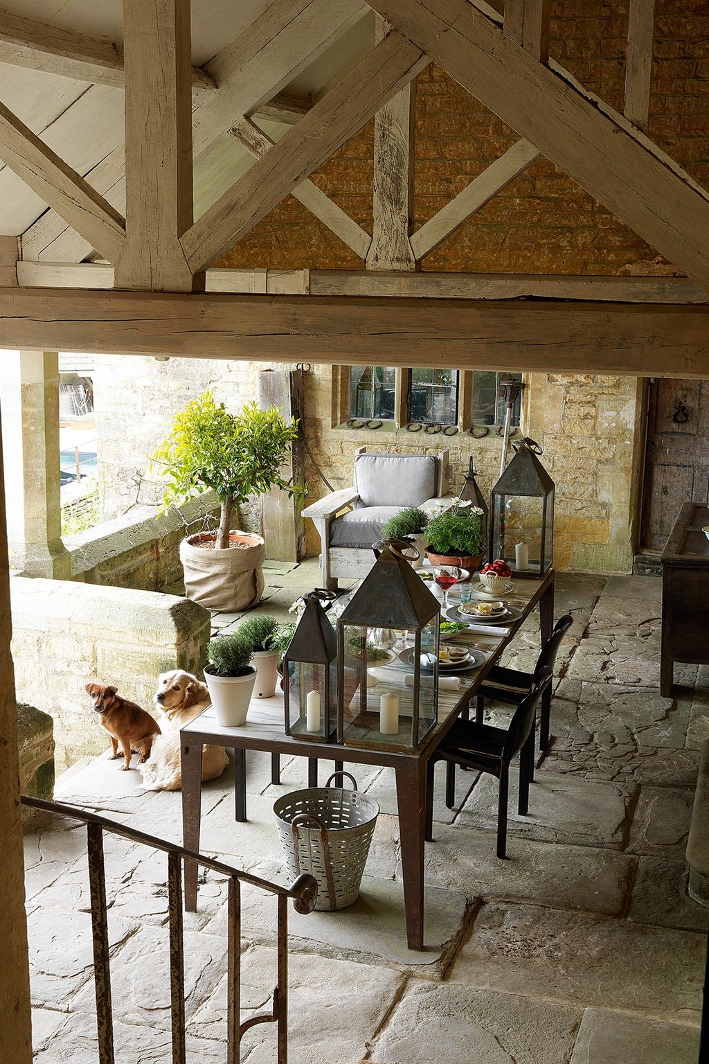 Image may contain Furniture Chair Table Living Room Room Indoors Couch Wood and Coffee Table