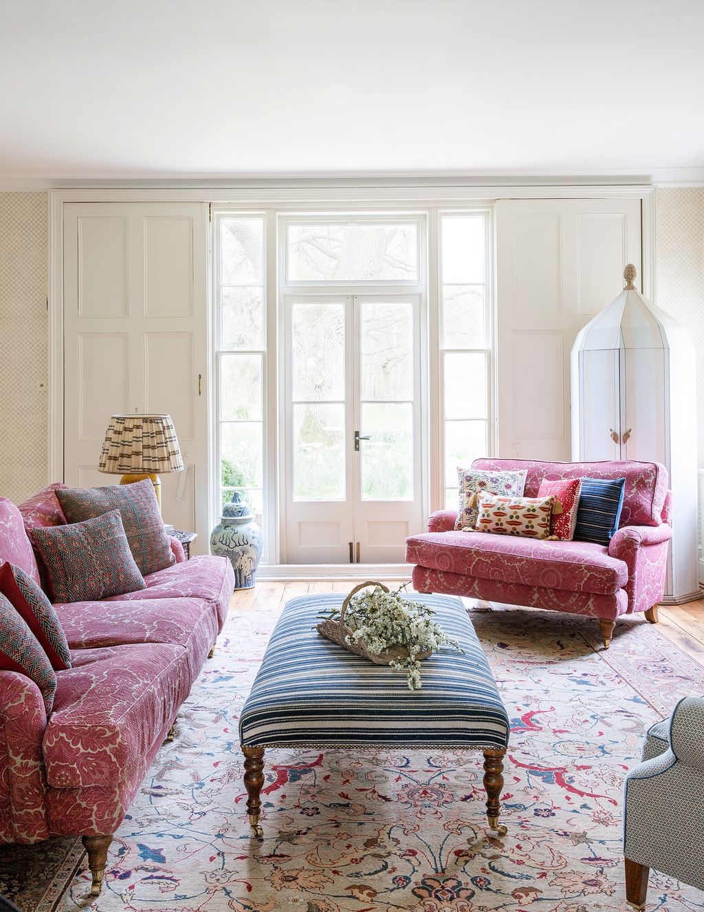 Image may contain Furniture Cushion Pillow Living Room Indoors Room Couch and Rug