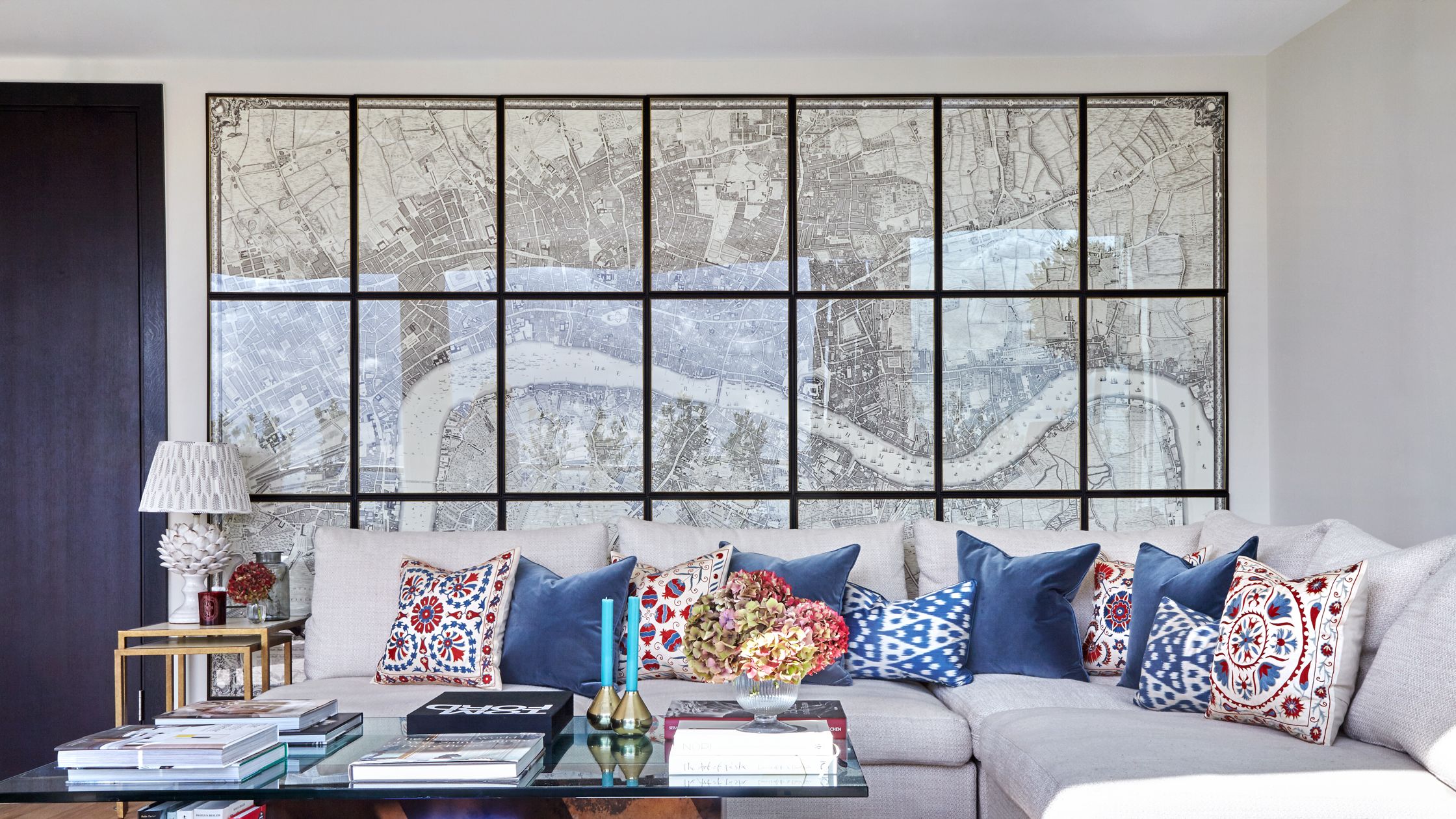 Image may contain Furniture Couch Table Living Room Indoors Room Cushion Coffee Table and Pillow