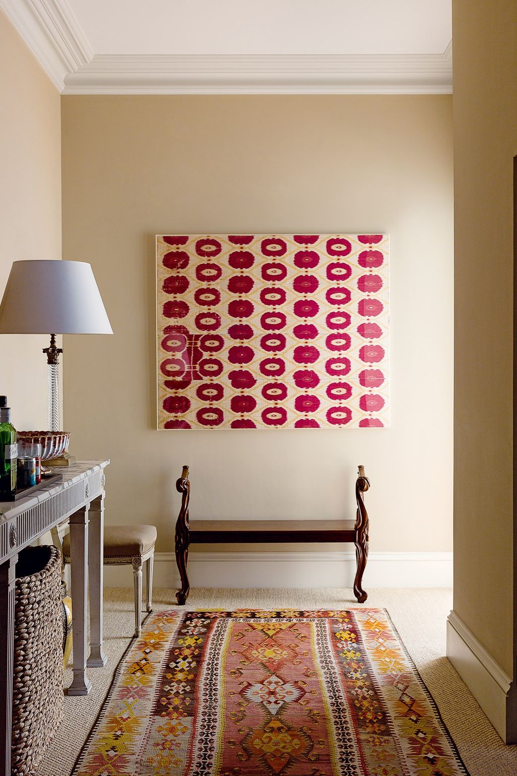 Image may contain Living Room Indoors Room Interior Design Rug Flooring Home Decor Furniture Floor and Lamp