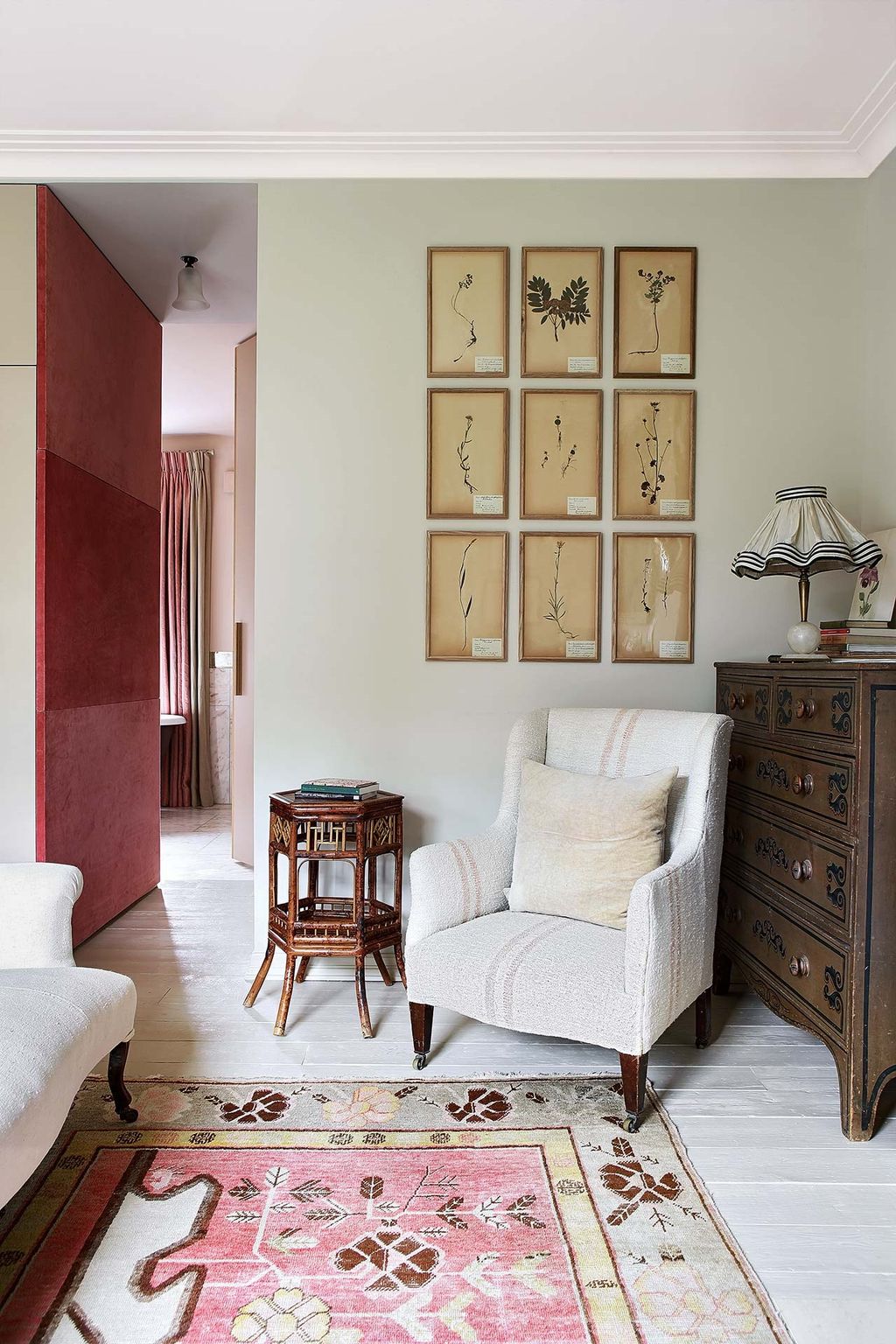 Image may contain Furniture Rug Living Room Room Indoors and Interior Design