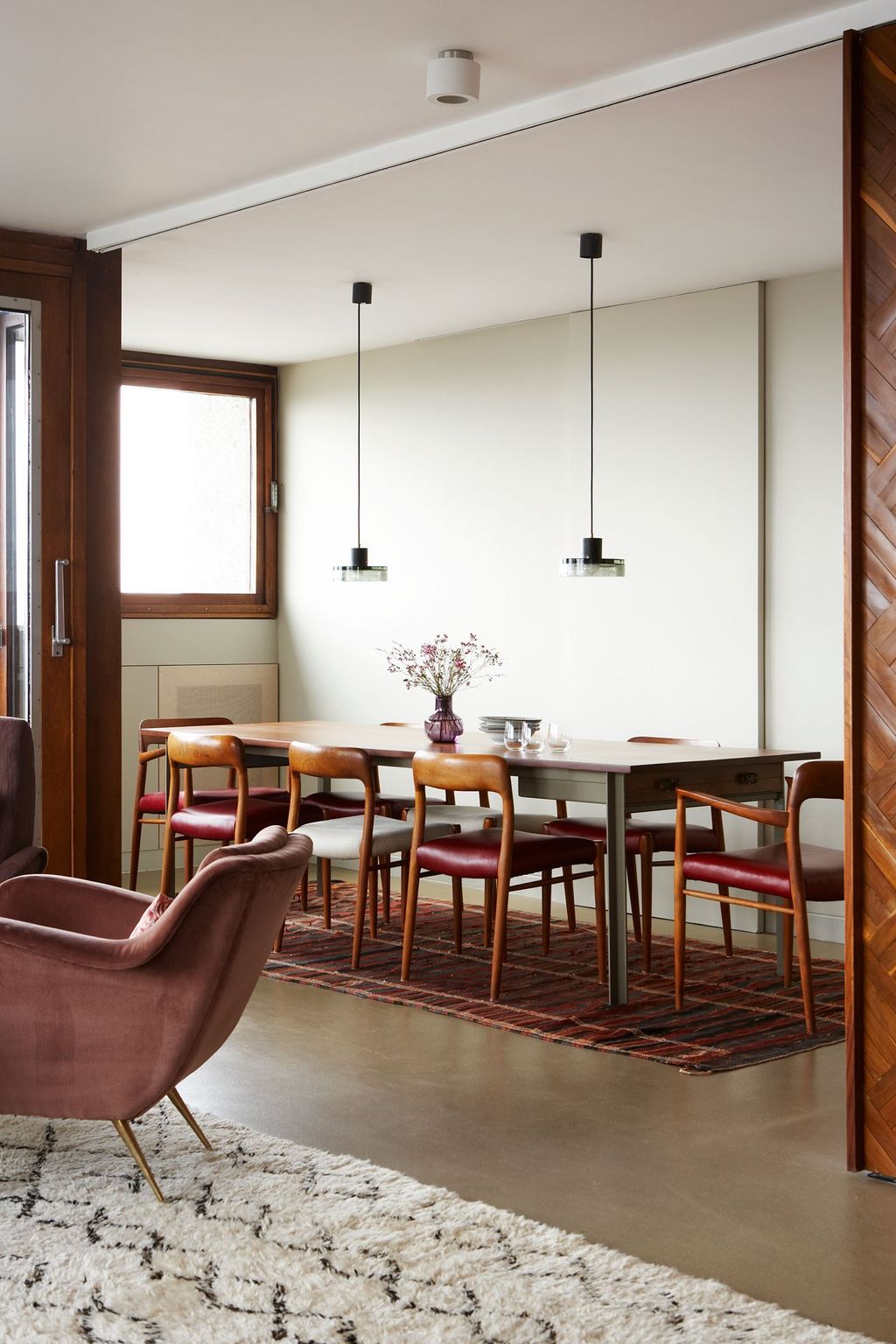 Image may contain Furniture Chair Room Indoors Interior Design Wood Dining Room and Table