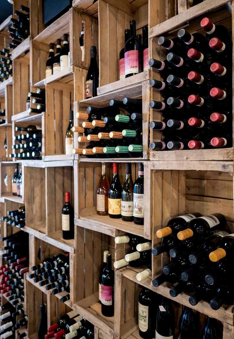 Image may contain: Drink, Alcohol, Wine, Beverage, Bottle, Wine Bottle, and Shelf