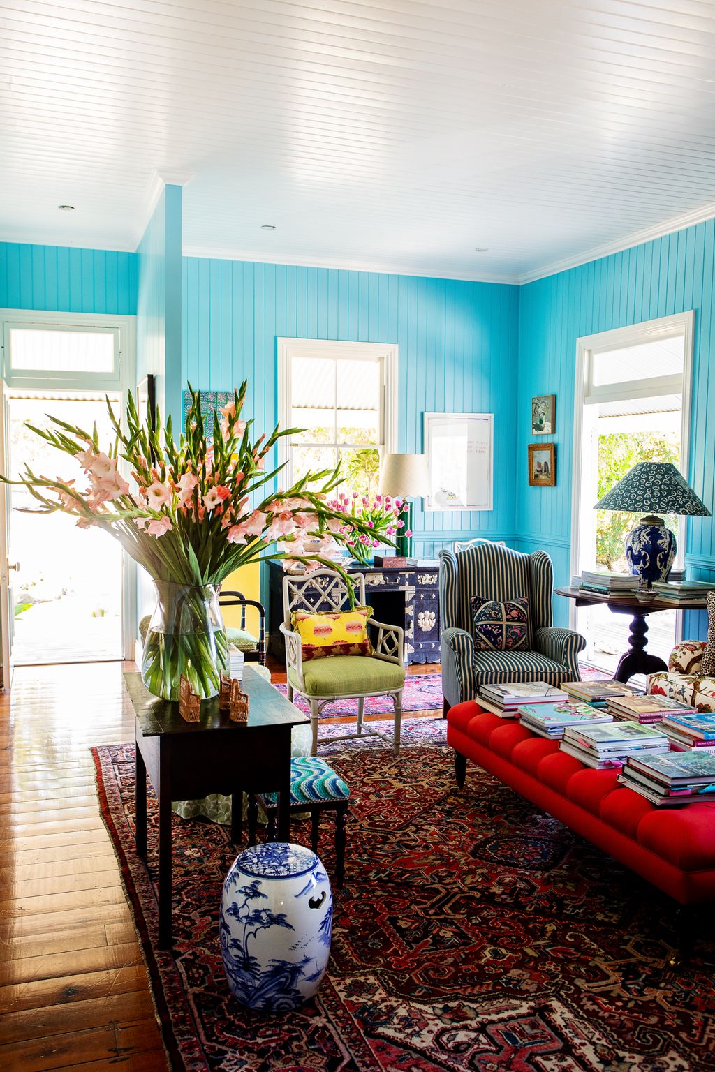 Image may contain Furniture Chair Living Room Room Indoors Rug and Table