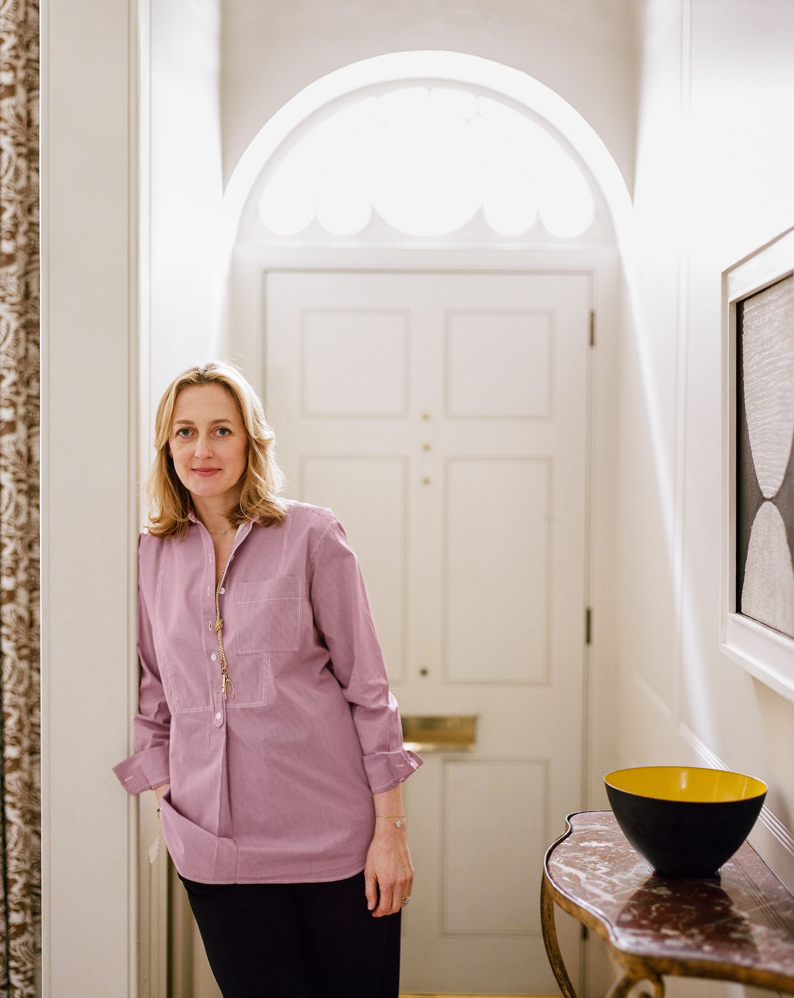 Image may contain Clothing Apparel Sleeve Home Decor Long Sleeve Human Person Door and Shirt