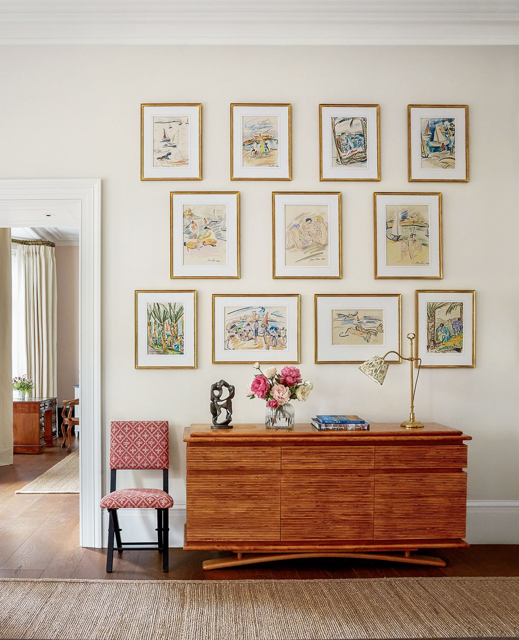 Image may contain Furniture Flooring Living Room Room Indoors Floor Interior Design and Wood