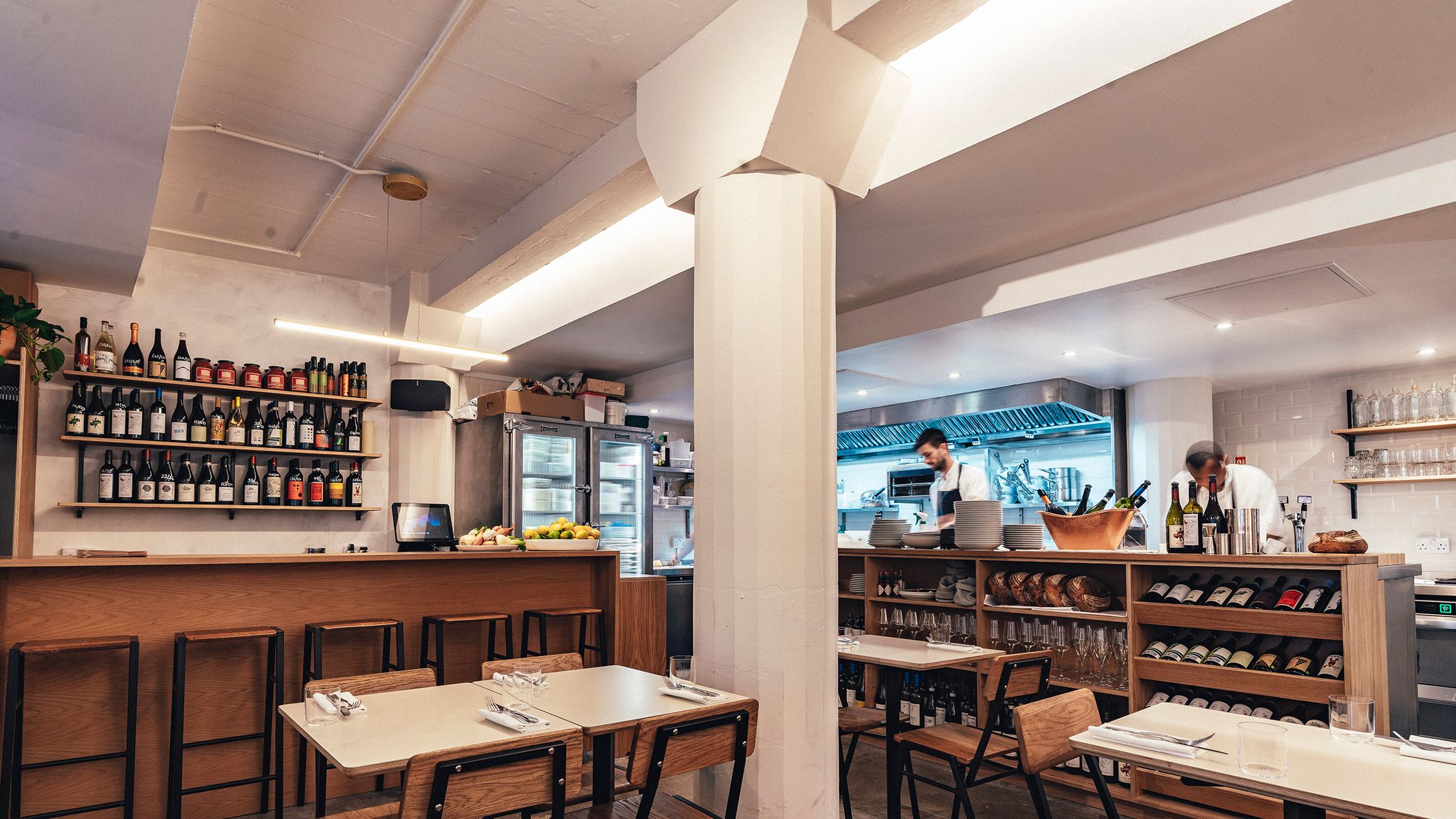 Image may contain Restaurant Wood Cafeteria Cafe Furniture Chair Human Person and Plywood