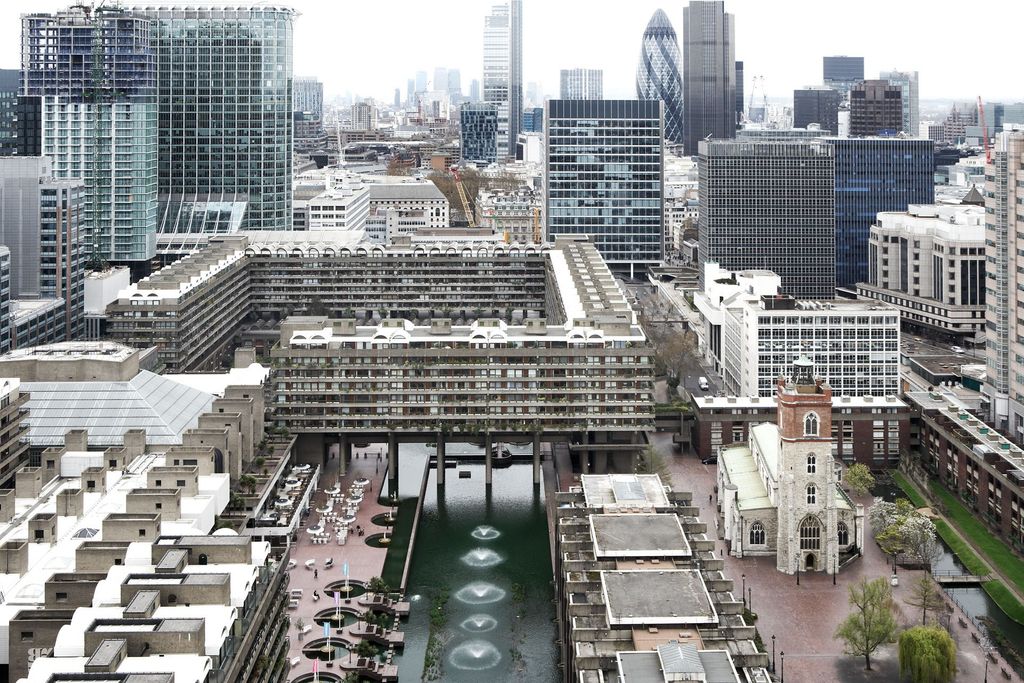 Image may contain City Town Urban Building Metropolis High Rise Downtown Office Building Architecture and Landscape